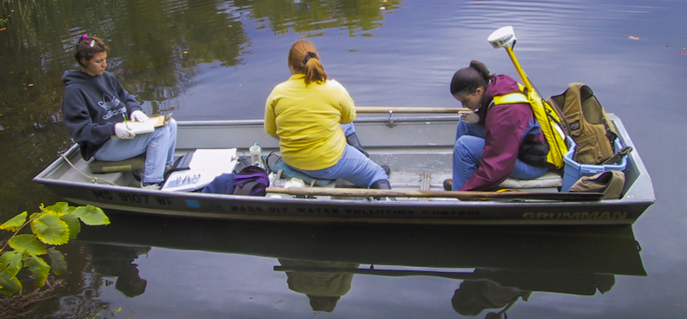 Environmental Engineering Students working on a boat