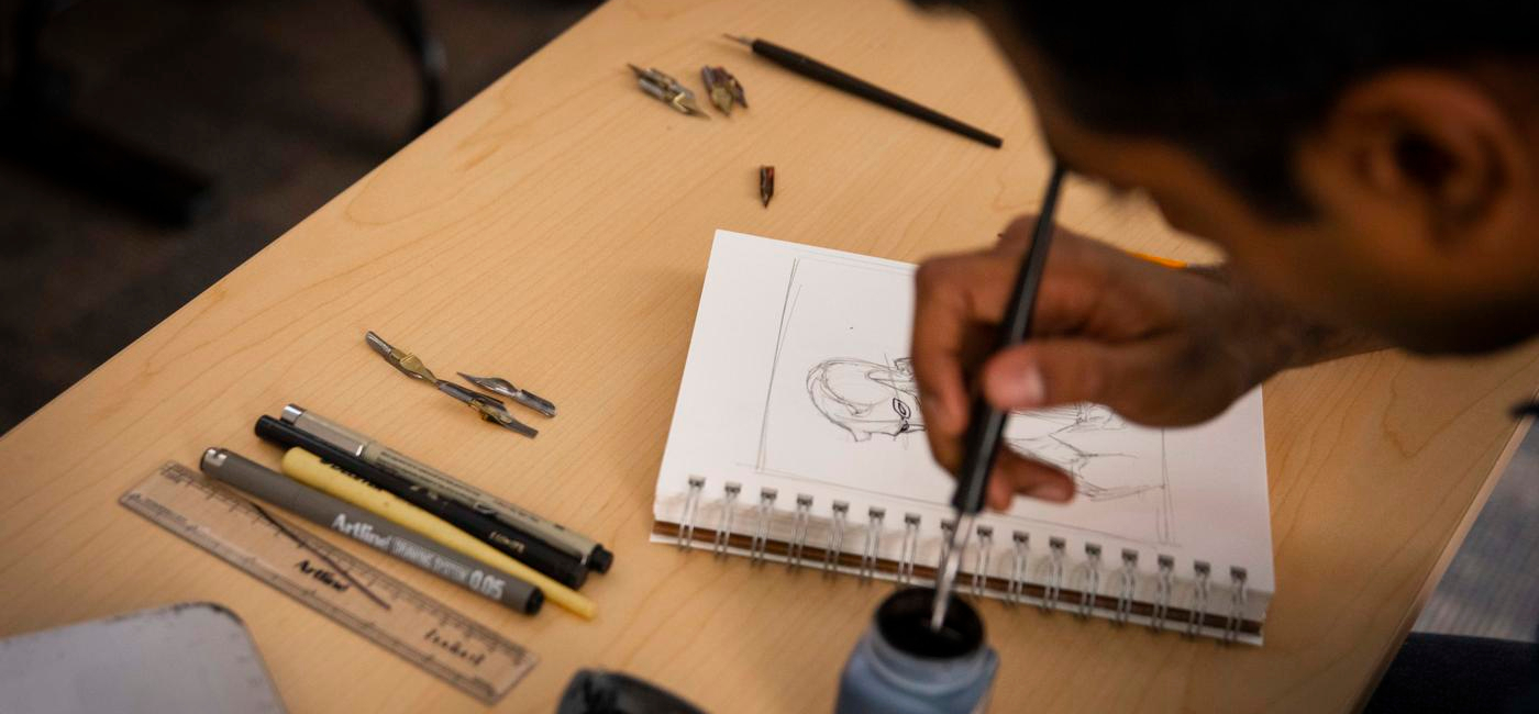 A student designs a character for his IMGD project