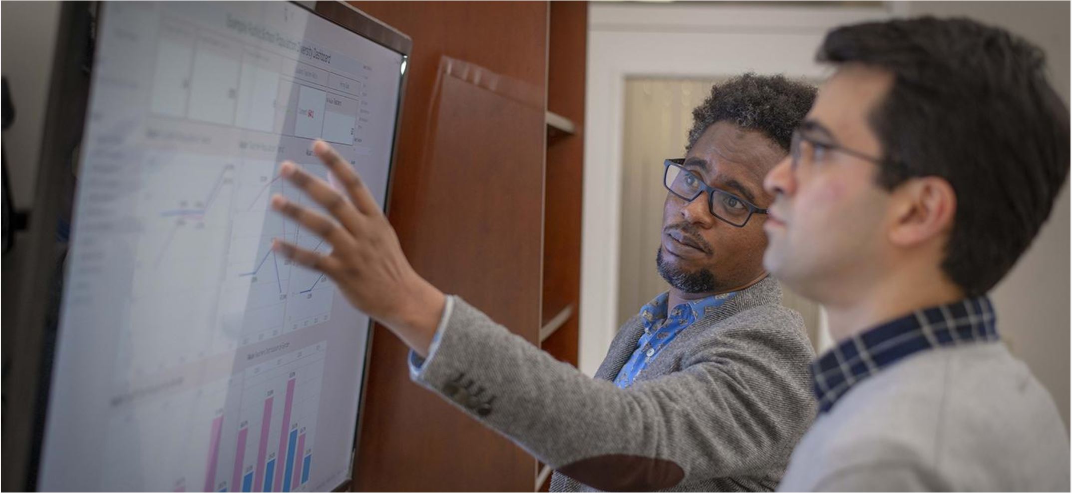 Professor teaching student