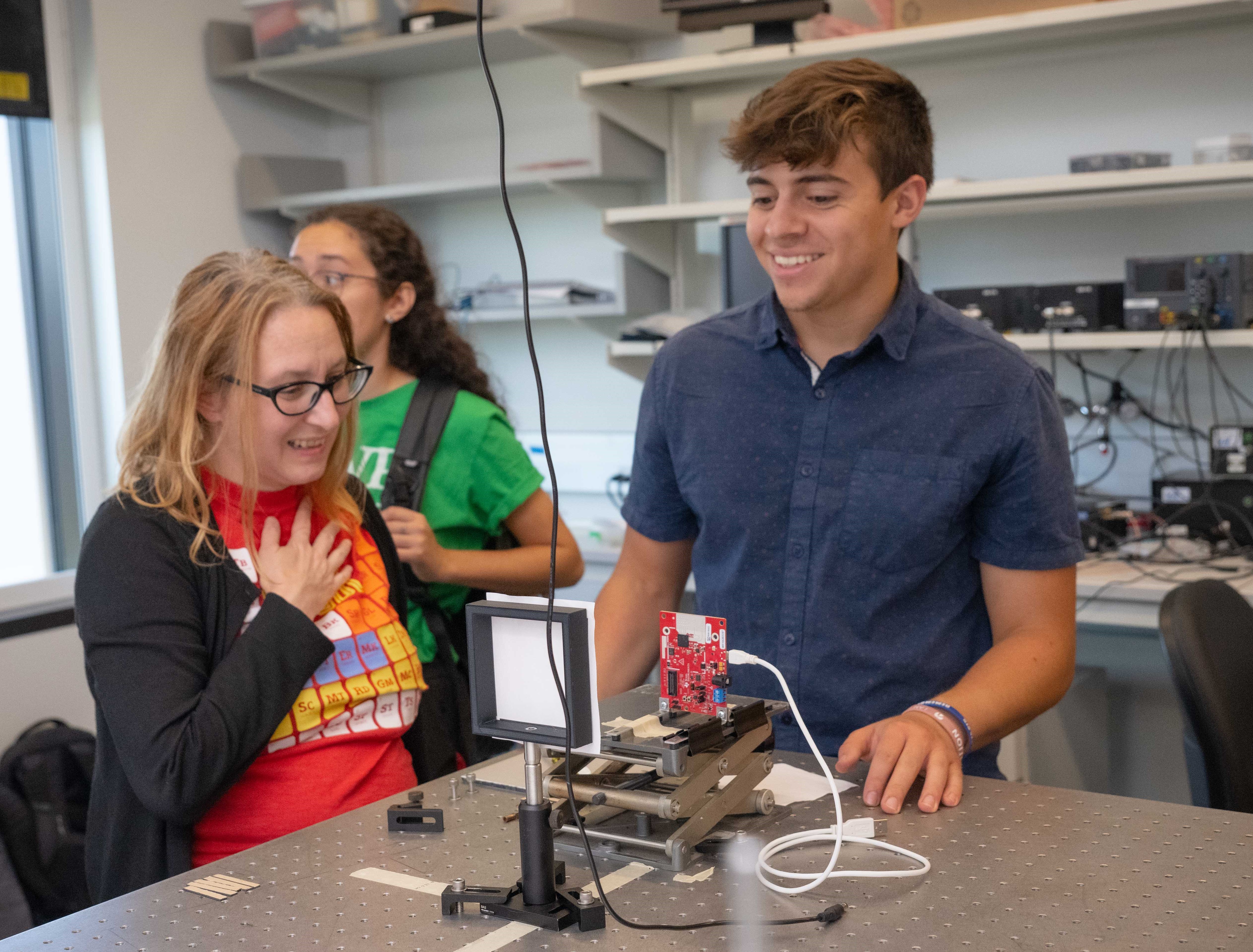 Two smiling teachers working in a lab