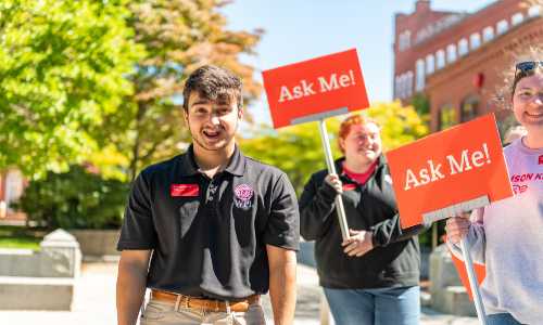 Student representatives work during a campus open house.