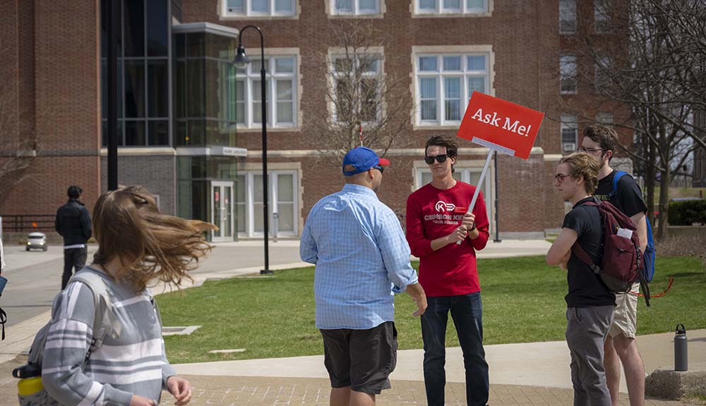 A student talks with a visiting parent during Accepted Students Day.