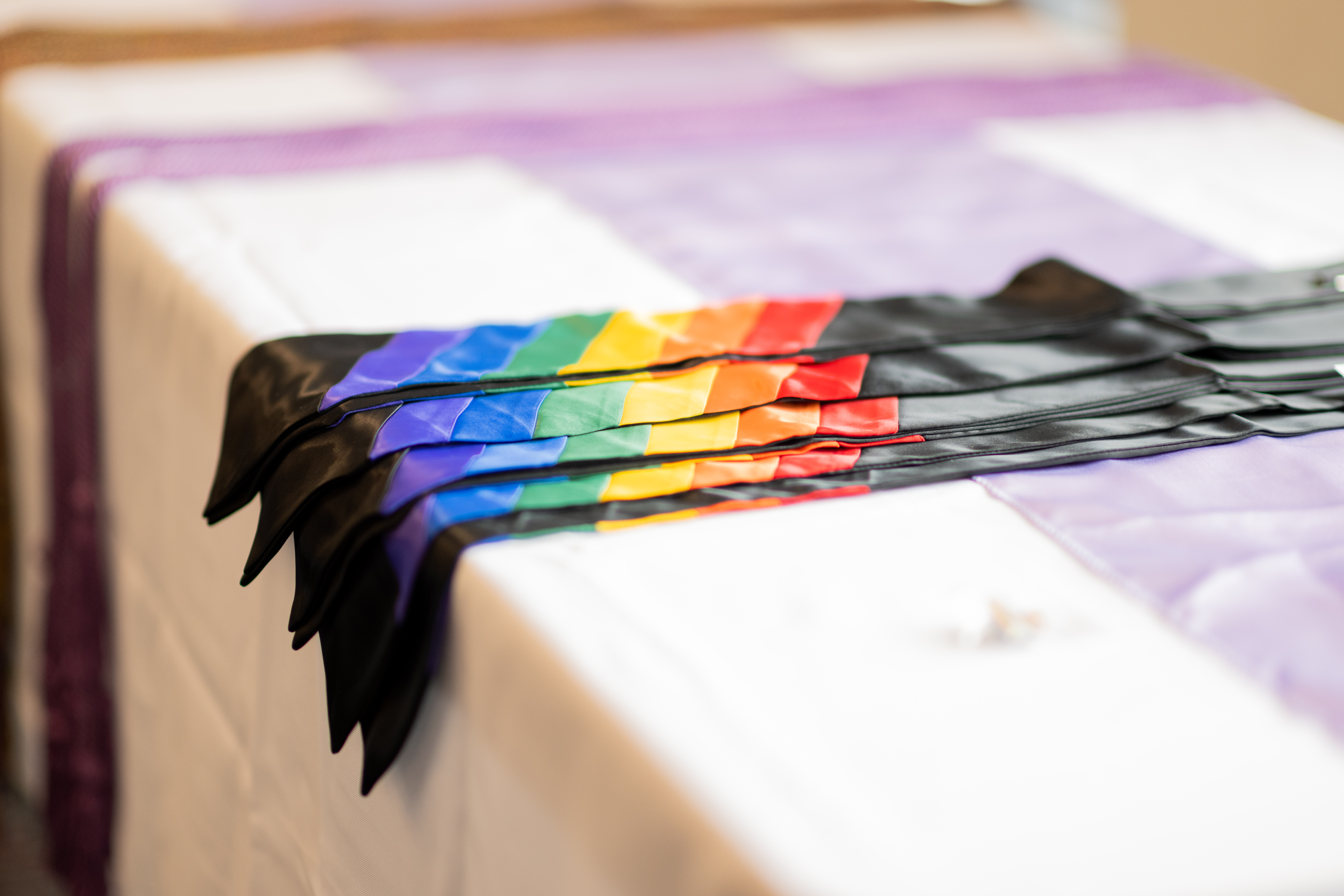 Lavender Commencement rainbow stoles and lavender honor cords