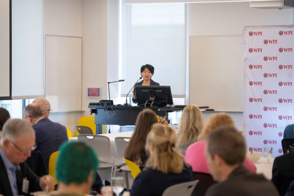 WPI president Grace Wang speaking to audience at the Board of Trustees Outstanding Staff Awards luncheon