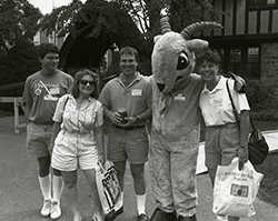 Four alumni and Gompei celebrate Homecoming