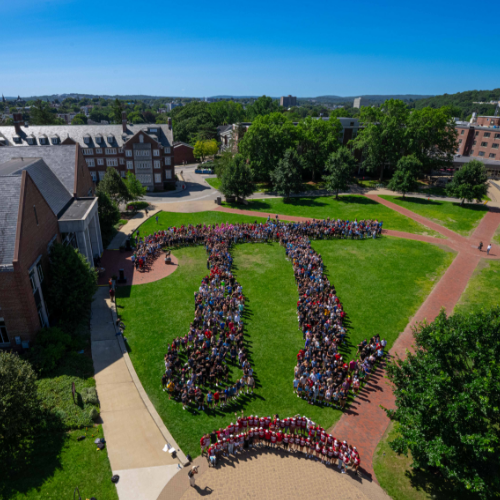 WPI Students in formation of Pi symbol