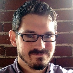 Headshot of professor Lane Harrison