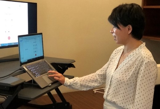 President Grace Wang using Zoom phone on her computer