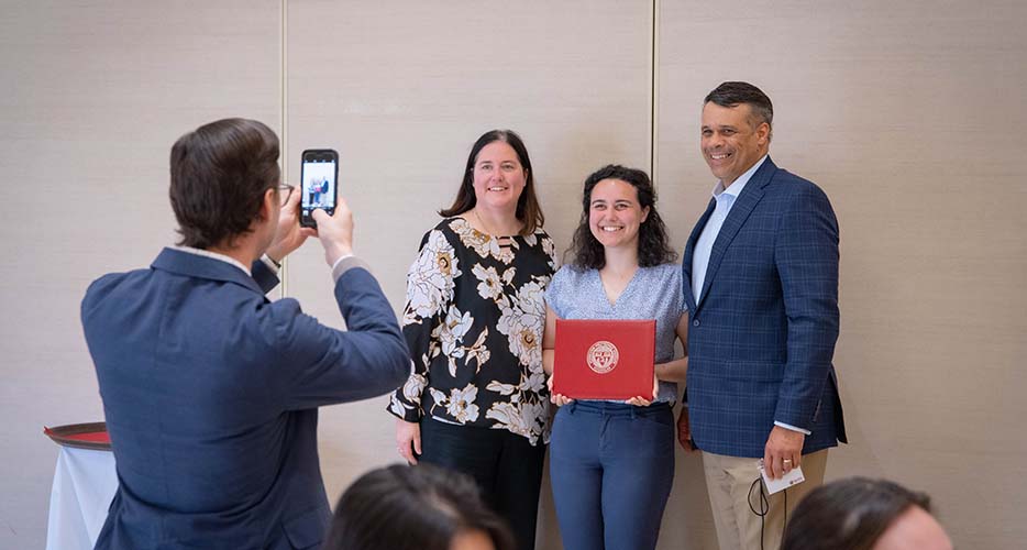 A student accepts an award.