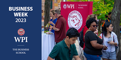 Members of The Business School community at an outdoor event on Freeman Plaza