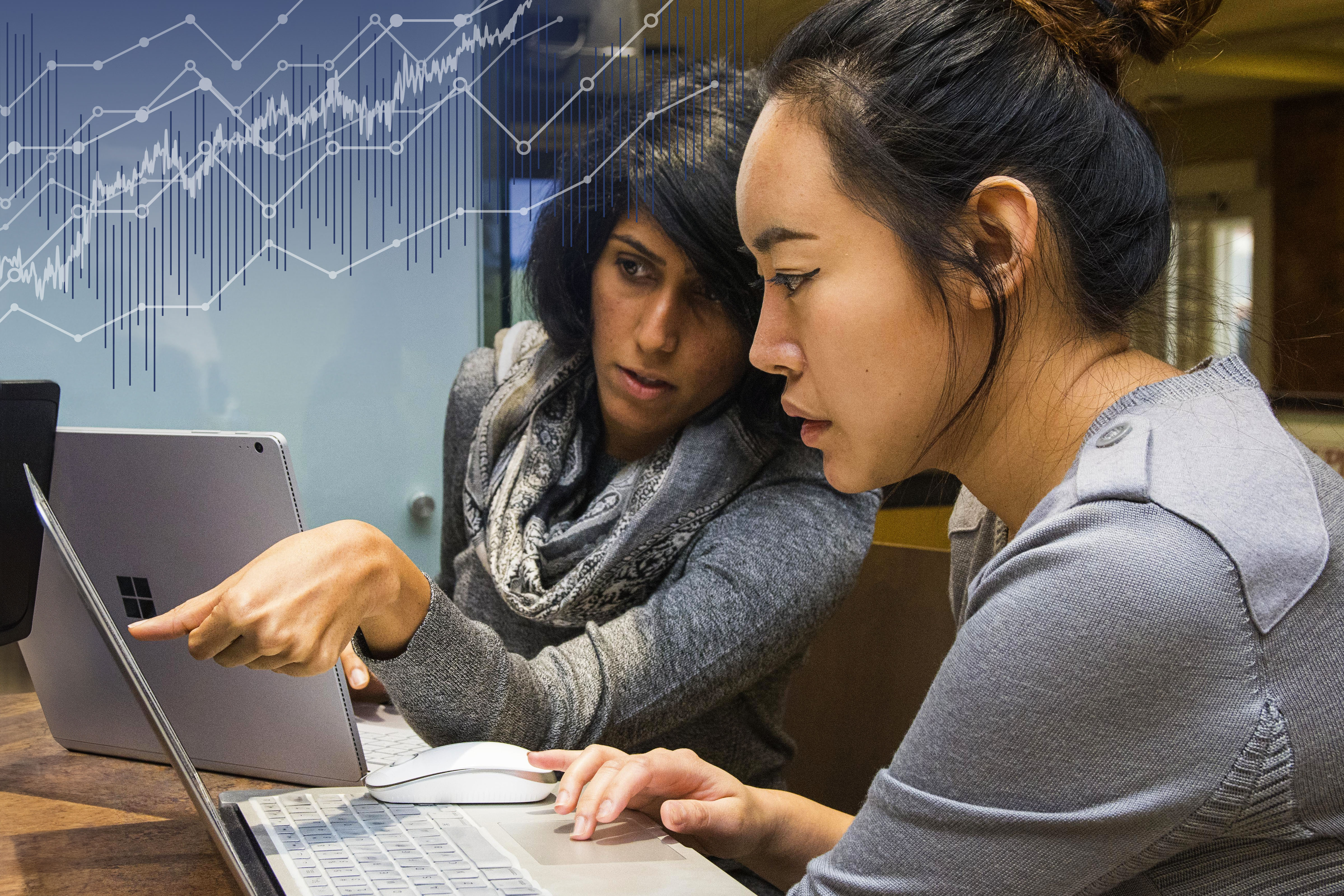Two students at a computer