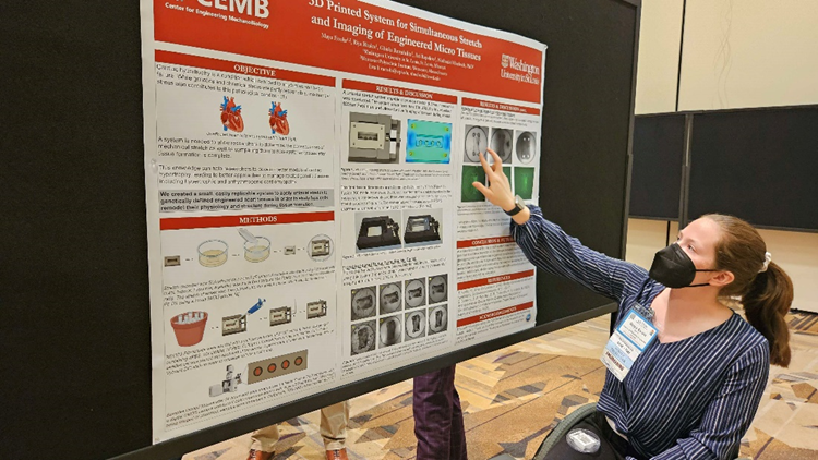 Maya Evohr presenting her poster “3D Printed System for Simultaneous Stretch and Imaging of Engineered Microtissues.”