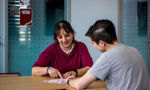 Career Development Center staff member advising a student