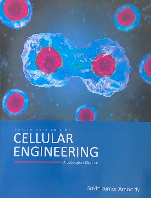 A science book with a blue cover, titled Cellular Engineering: A Laboratory Manual