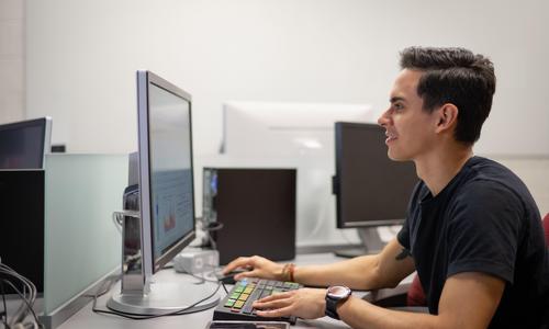 Student sitting at a computer