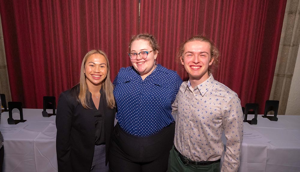 The three members of the winning team for this year’s President’s IQP Award smile for a photo.