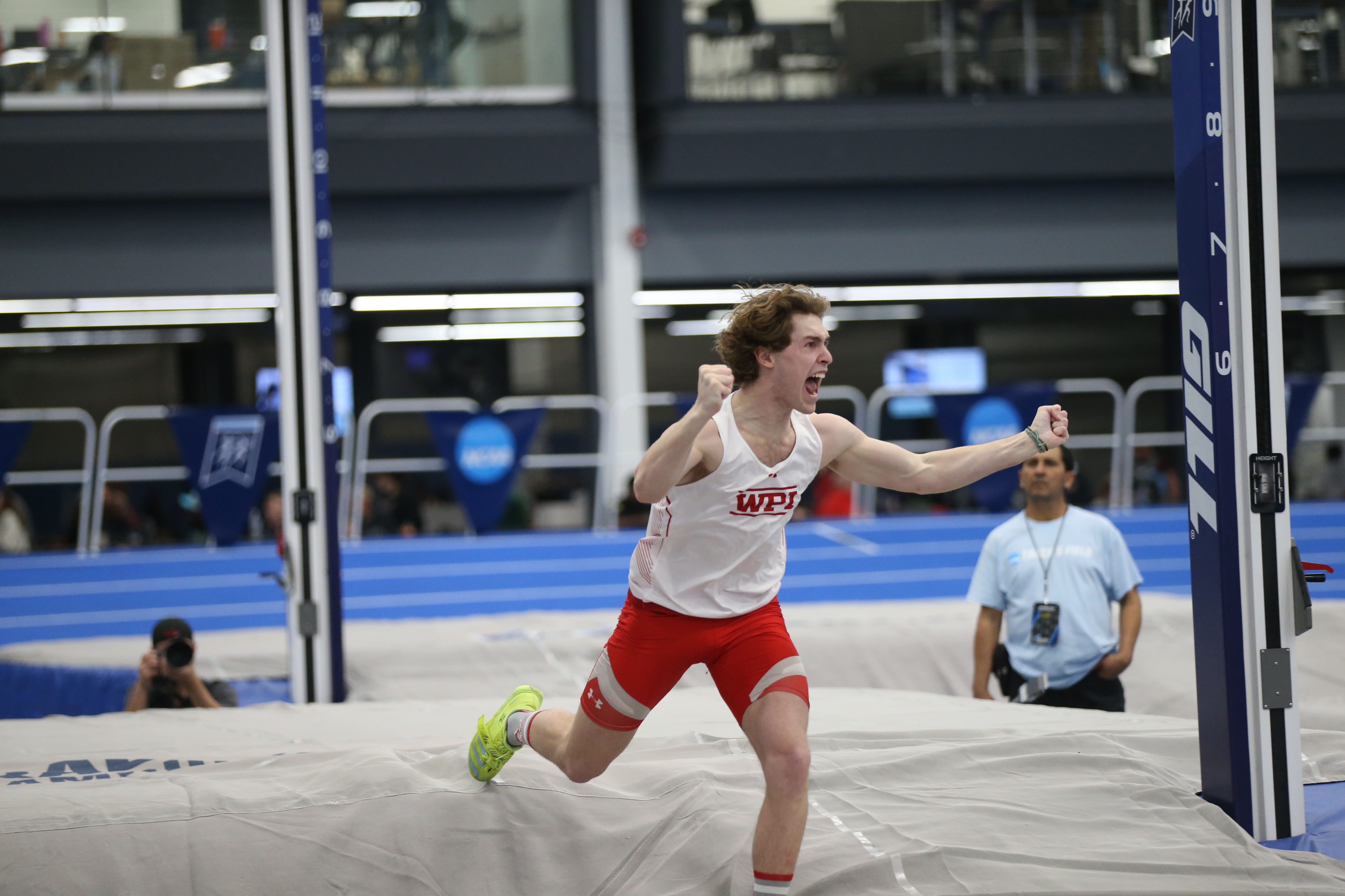 Gavin Fleck sets pole vault school-record with a height of 16-4.