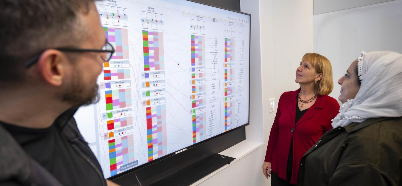 WPI Professor Elke Rundensteiner works with students on an NSF-funded project on fairness in artificial intelligence.