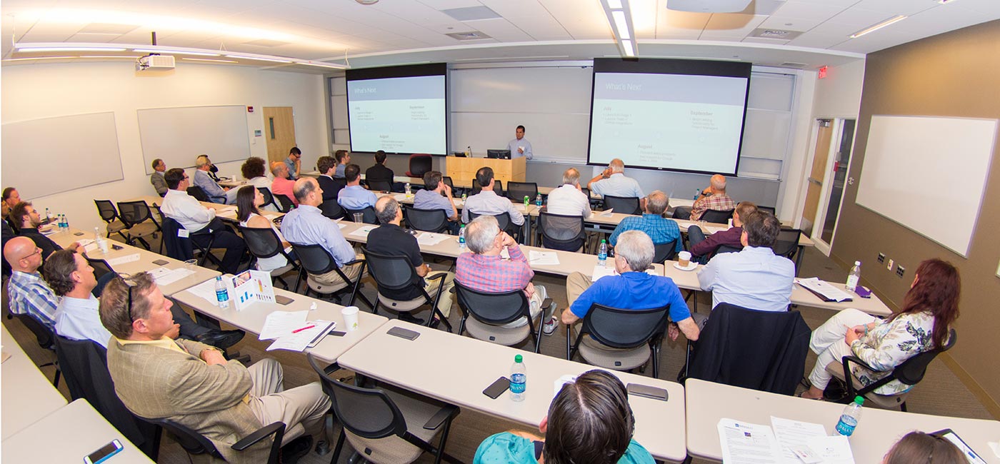Adult students in a WPI classroom looking forward