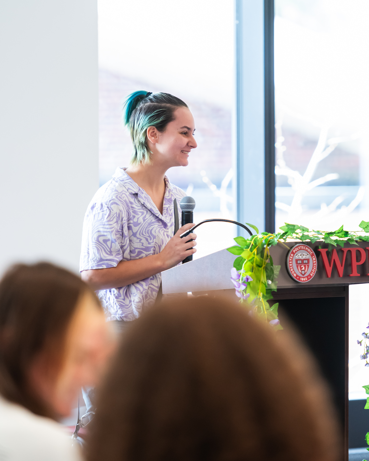 Quinn Sandberg ’25, Vice President of the Alliance, speaking at Lavender Commencement 2024.