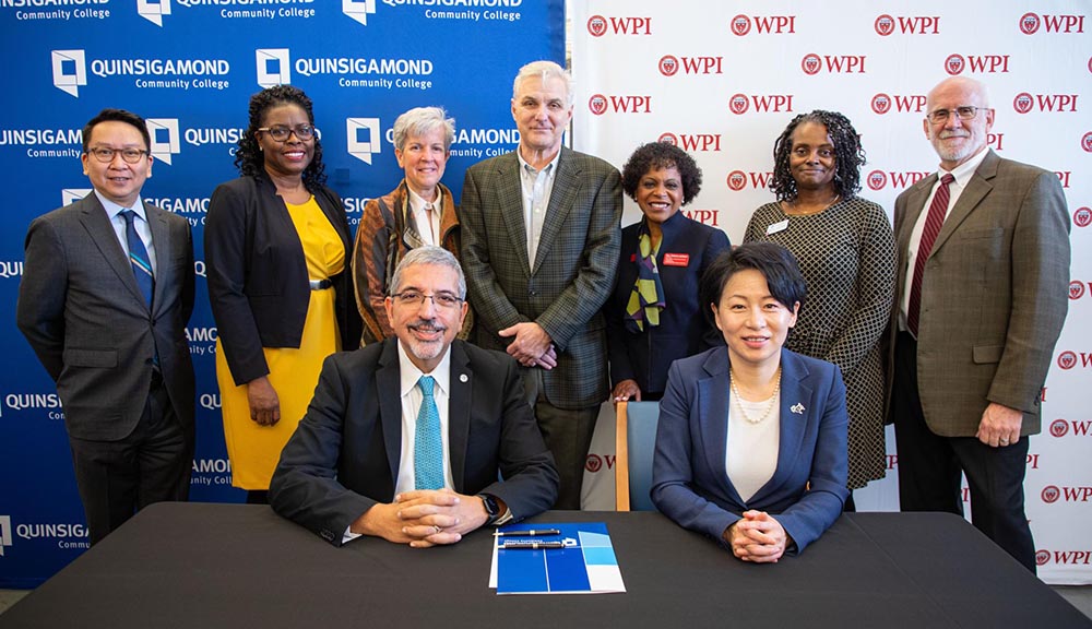 A group photo during the QCC agreement announcement.