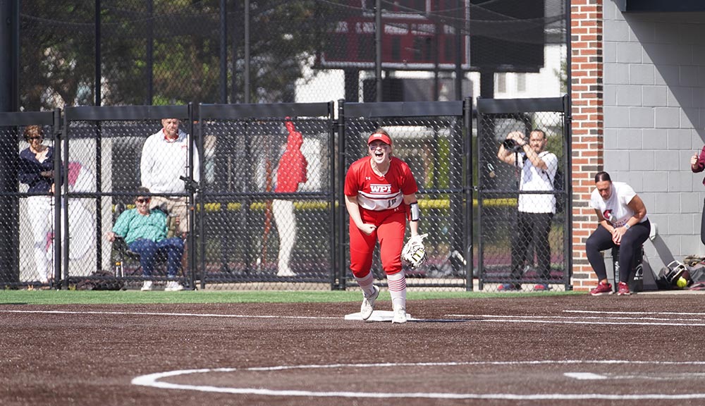 The first baseman on the WPI softball team celebrates a win.