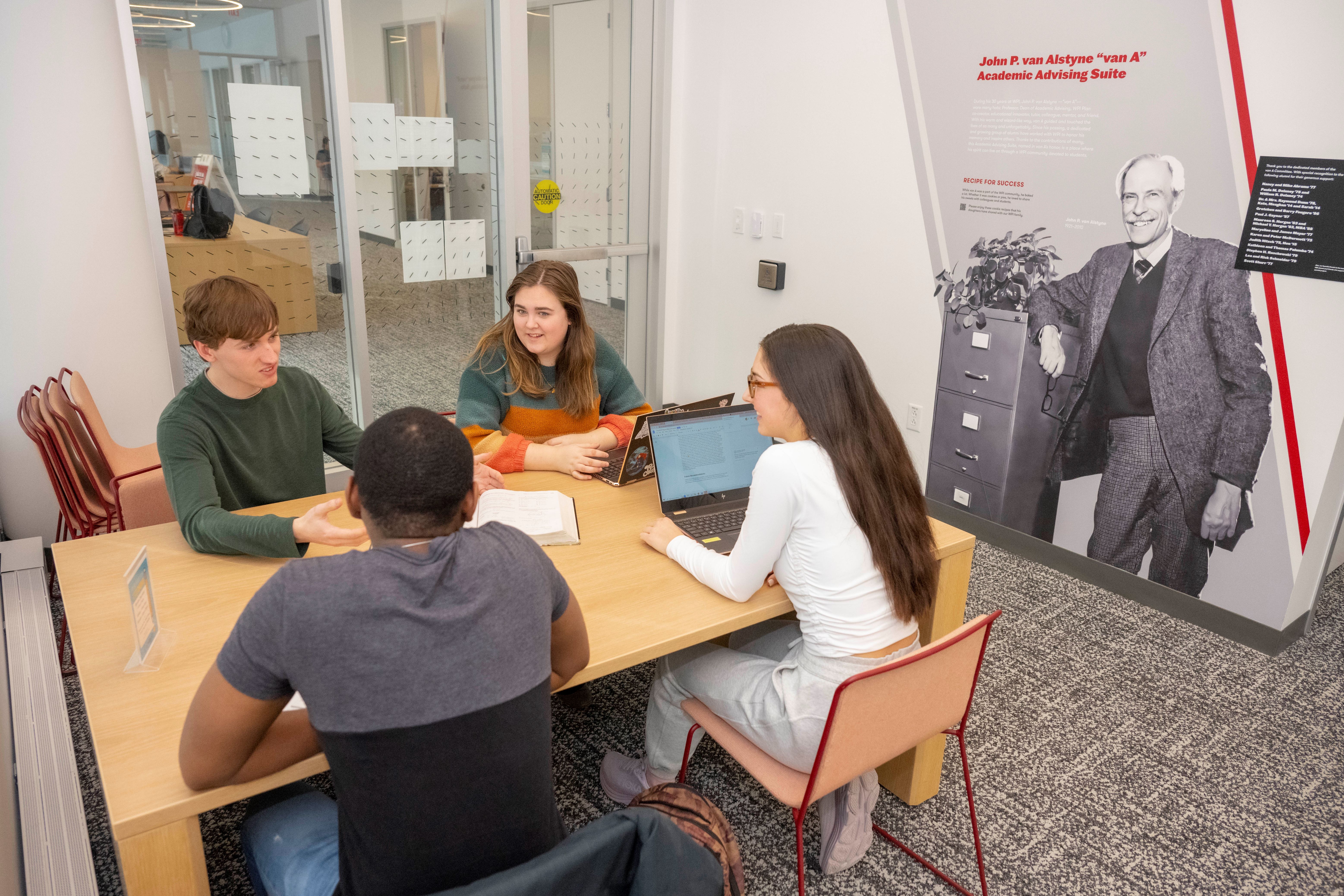 students sitting around table