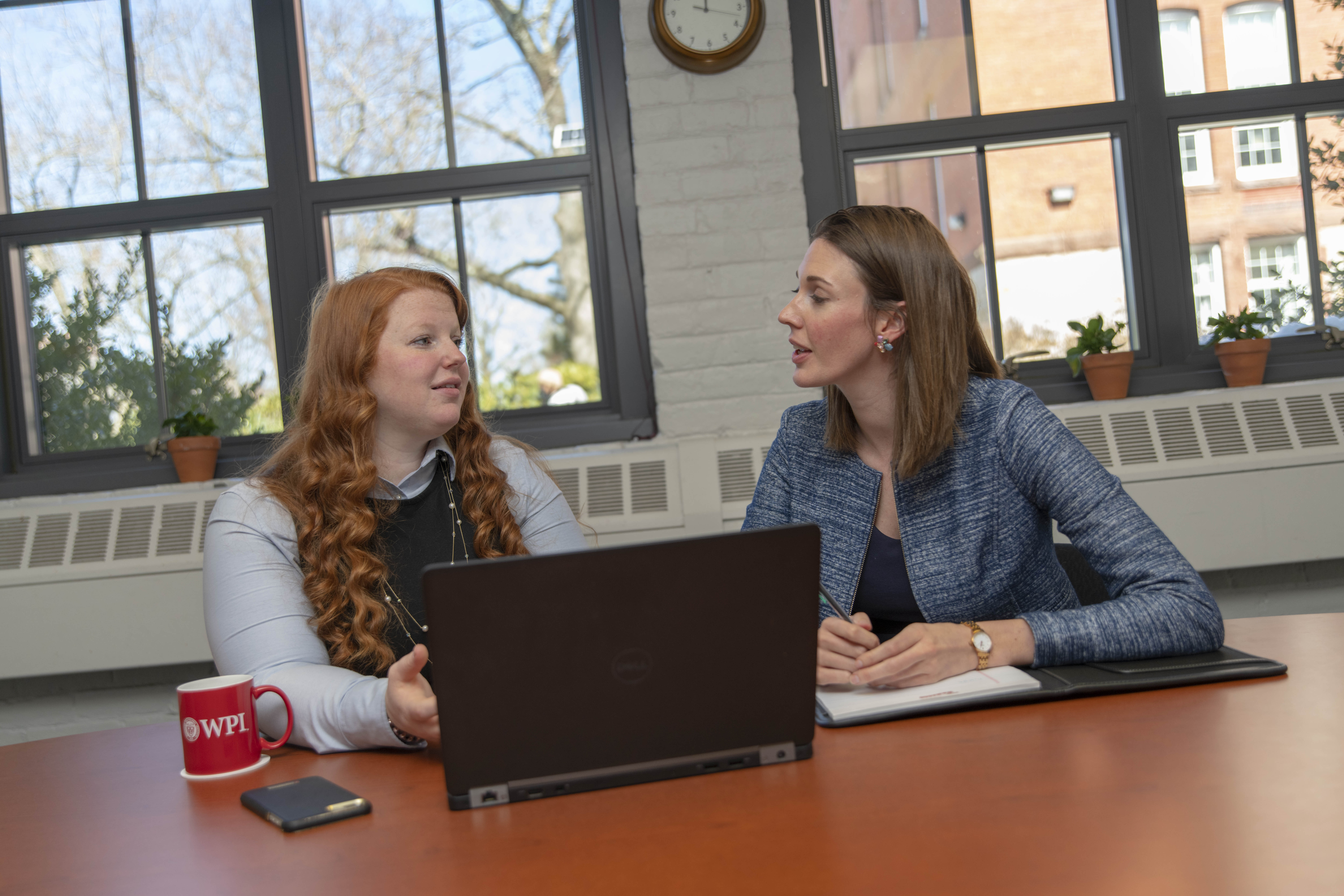 staff talking with student