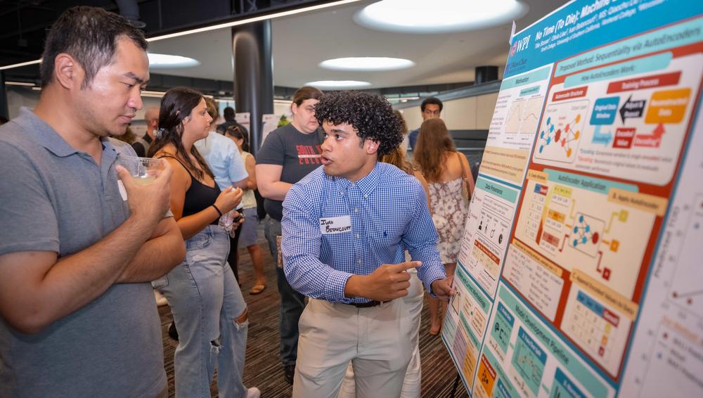 Ivan Betancourt discusses AI research at WPI’s Summer Research Showcase.