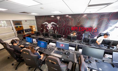 students sitting at computers playing video games