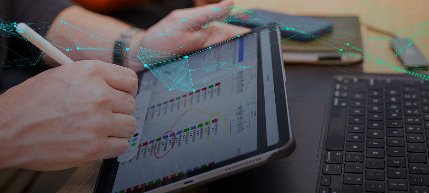 Hand engaging with data on a tablet device with an overlay that evokes data and a network.