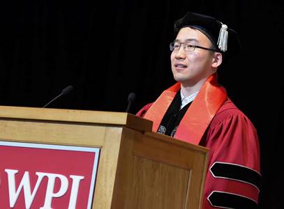 Student Speaker Tan Zhang at the podium