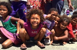 Children at the Flamingo Crescent preschool enjoy having a photo taken.