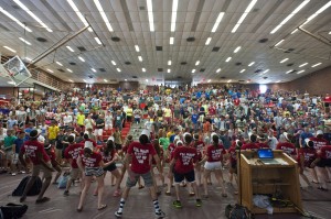 Members of the Class of 2018 participate in a rally in Harrington Auditorium as part of New Student Orientation.