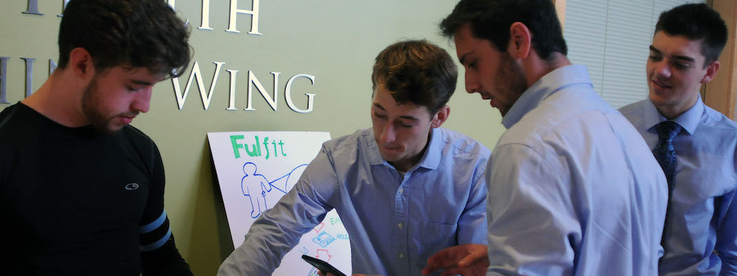 First place students reviewing project