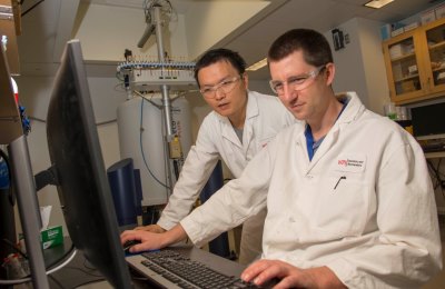 Postdoctoral scholar Yong Guan, left, and graduate student Jonathan Attard 
