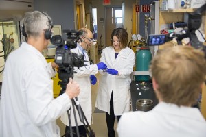 A BBC videographer records interaction between Horizons host Adam Shaw and Professor Marion Emmert.