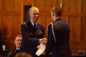 Lt. Col. Michael L. DeRosa, Detachment 340 AFROTC commander, offers his congratulations.