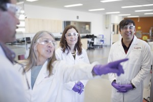 BETC director Kamal Rashid, left, points out some lab features to visitors.