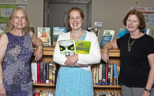 From left, Karen Bohrer, Tressa Santillo and Joan Dickert, along with Rebecca Ziino (not pictured), select the books for the library’s popular collection.