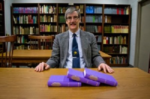 Joel Brattin with the three volumes in the Robert D. Fellman Collection at the Gordon Library.