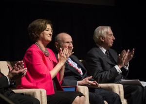President Leshin on the stage with Bernard M. Gordon and C.D. Mote Jr.