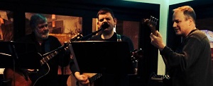 Guitarists Dave Degon and Brian Degon and bassist Fr. Greg Christakos comprise Two Left, who will play in the Campus Center at noon on Wednesday.