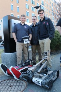 Brendan McLeod, Brian Eccles and T.J. Watson with WALRUS and the Packbot.