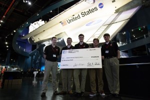 The WALRUS team, from left: Brian Eccles, Brendan McLeod, T.J. Watson, Tim Murcko, and Mitchell Wills. In the background is the Atlantis shuttle.