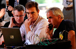 (l-r) Rob McCroskey, senior scientist, Honeywell; Bill English, vice president of Products and Projects, TRX Systems of Greenbelt, Md.; and John Sullivan, deputy fire chief, Worcester Fire Department, review firefighters’ locations on a monitor during a recent rescue demonstration at WPI.